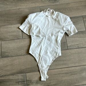 Hanifa bodysuit